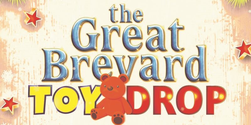 The Great Brevard Toy Drop graphic with a red teddy bear in the center and three red stars.