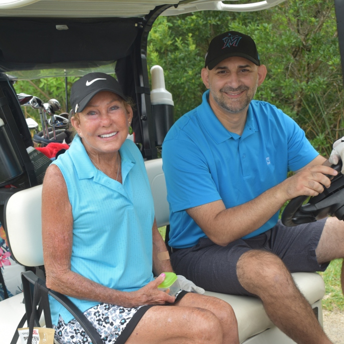 Golfers pose for a photo at the Annual Sandbagger Classic Golf Tournament